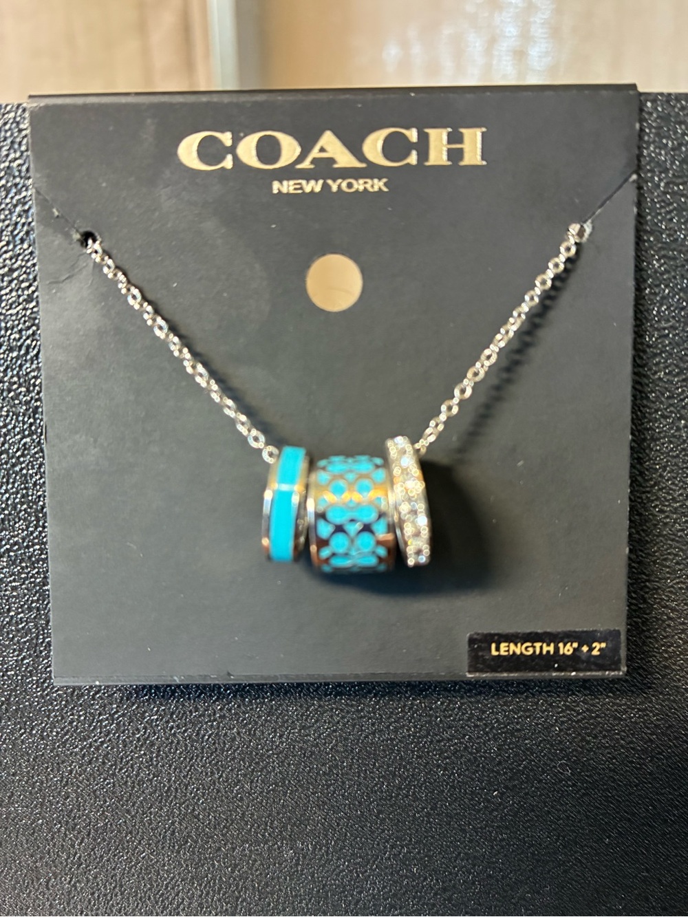 Coach Turquoise and Silver Charm Necklace - Picture 1 of 2